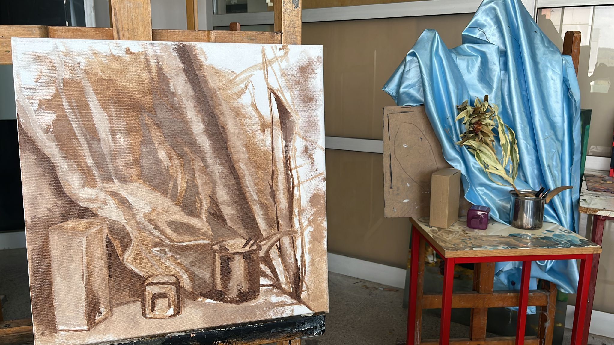 Still life and its painted study on canvas.